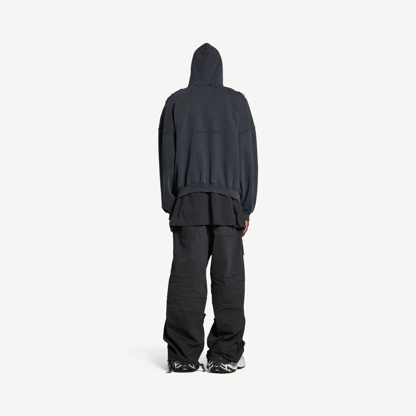 a black hoodie and pants 
