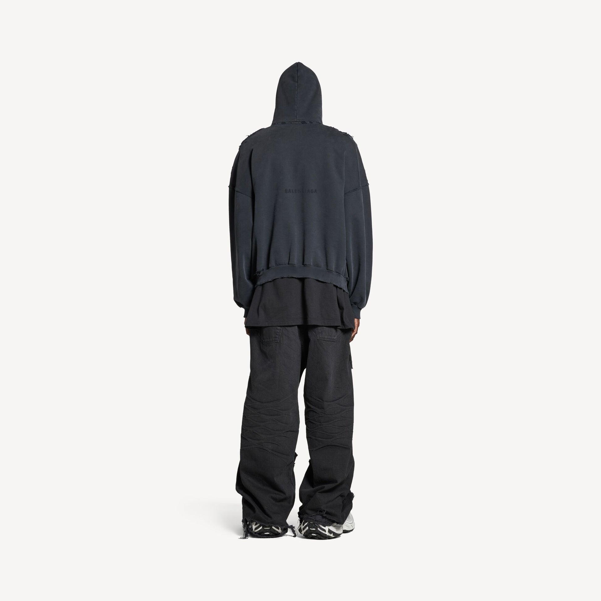 a black hoodie and pants 