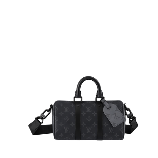 Black handbag with monogram pattern on a white background