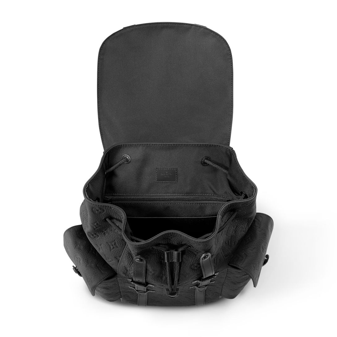 Black tactical backpack on a white background