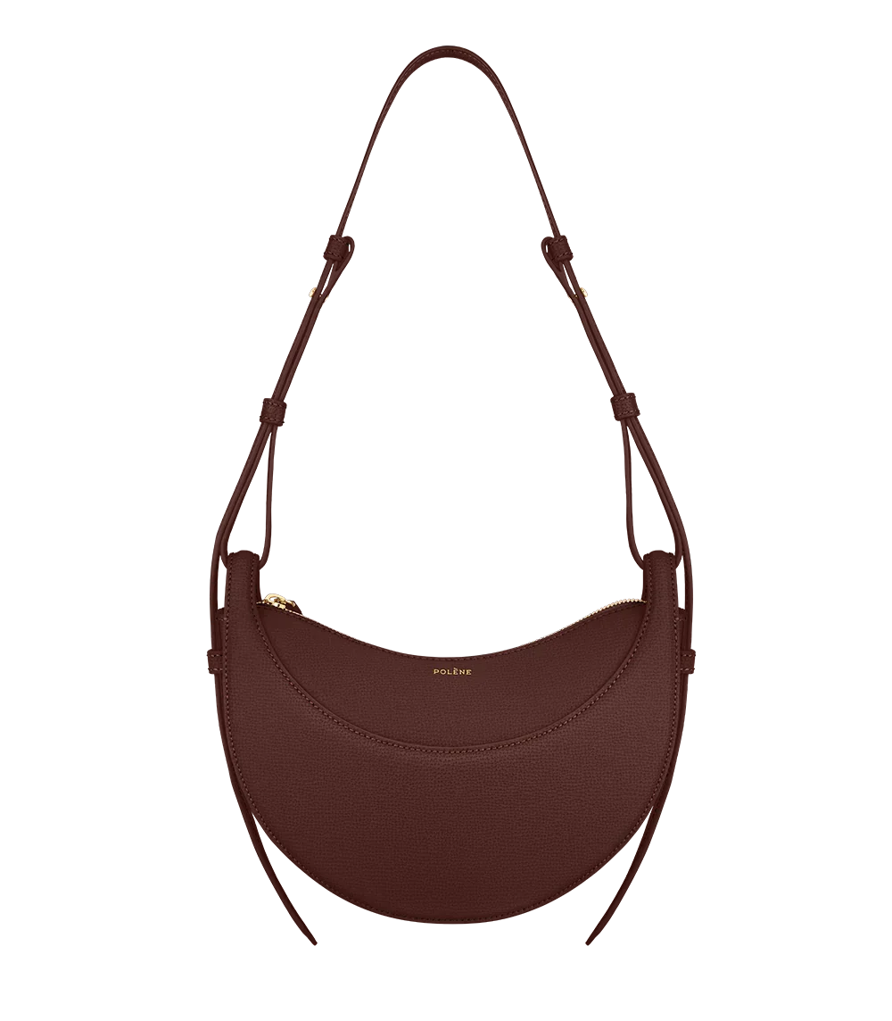 Red crescent-shaped leather crossbody handbag with gold zipper, Iconkart shop