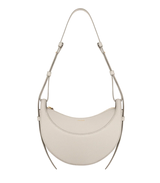 Elegant white leather shoulder bag with adjustable strap, displayed on Icon Kart Shop