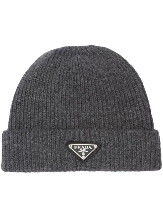 Gray knit beanie with Prada logo on a white background