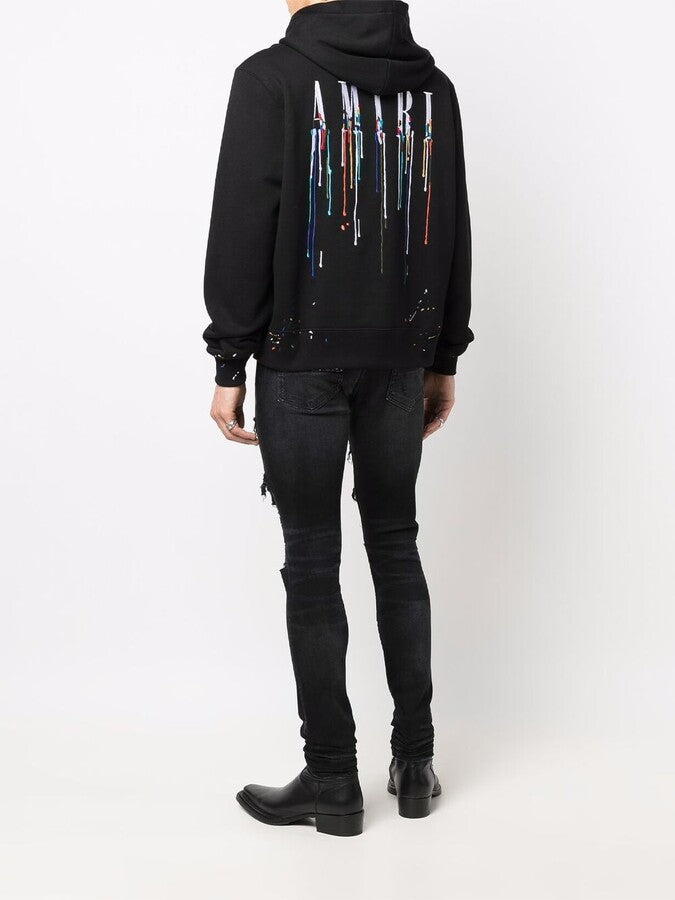 a black hoodie with colorful designs on the back, Iconkart shop